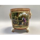 Late 19th / early 20th century French porcelain jardiniere with cartouche containing two children in