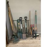 Quantity of garden implements comprising; long reach rose cutter, spades & forks, etc.