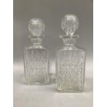 Pair of Thomas Webb Wellington cut glass decanters, extensively cut with star decoration, with globe