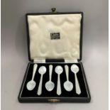 Six mother of pearl ice cream spoons by Ogden and Sons ltd. St James's St Harrogate, in fitted case