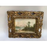 River landscape with figures in a rowing boat. Oil on panel. Unsigned. Moulded, foliate and