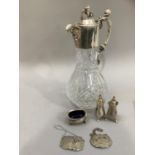 Silver plated and cut glass ewer with lion finial and mask spout, and moulded handle, silver plate