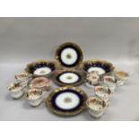 A set of six 19th century English porcelain teacups painted in the Imari palette with pagoda and