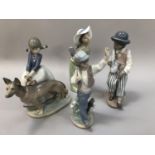 Lladro figures comprising, Girl with dog no.1533, Saxophone player no.5833, Boy with guitar no.