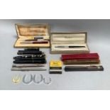 A collection of fountain pens and pencils of various makes, including Parker.