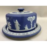 19th century Wedgwood jasperware stilton bell with white applied decoration on dark blue ground 23cm