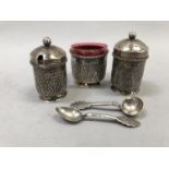 A Far Eastern three piece cruet in white metal (test as silver), comprising salt, pepper and mustard