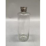 Victorian cylindrical glass bottle with screw top cap and cork, 19cm high