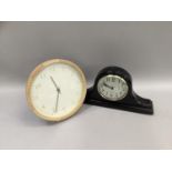 Nicholas and Elaine Hostler ebonised mantle clock 44cm wide, together with another