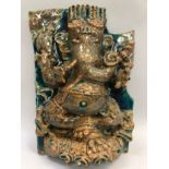 Terracotta relief plaque of the Hindu god Ganesha, with orange and blue glaze, 52cm high