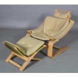 Nelo, Sweden, A laminated bentwood and cream leather chair on cantilever base together with a