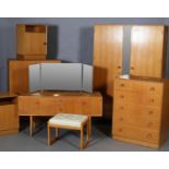 A Meredew oak veneer bedroom suite c1960s, including a double wardrobe, compactum, chest of five