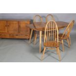 An Ercol blonde elm and beech dining suite including table with two leave, 224cm x 83cm extended,