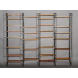 A Ladderax teak and black metal modular wall unit including five ladder uprights 200cm high,