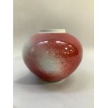 Peter Sparrey British (b1967) A Studio porcelain vase, peach bloom glaze, compressed ovoid,