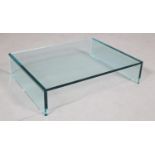 A glass stand, rectangular, 58cm wide x 45cm deep x 12.5cm high