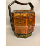 Chinese three tiered wedding basket of octagonal form lacquered with panels containing birds, fish