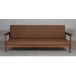 Guy Rogers, A Manhattan afromosia studio couch, the swivel back with storage compartment, original