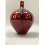 Peter Sparrey British (b1967) A Studio pottery vase, of sang de boeuf glaze, ovoid with narrow neck,