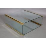 Gallotti and Radice, Italy, A glass and brass coffee table with low set undertier, on feet, 80cm
