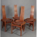 A set of four Brutalist Movement style oak chairs, 1970s, having a narrow six panel back curved seat
