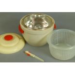 A Thermos model 929 ice bucket and cover, cream plastic with red handles, ivory plastic lid with