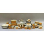 A quantity of Midwinter Stoneware 'Sun' pattern tableware comprising eight tea cups, twelve saucers,