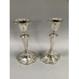A pair of Edward VII silver candlesticks, London 1901 for Goldsmiths and Silversmiths Co Ltd,