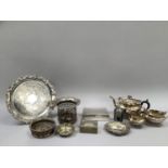 Quantity of silver plated ware comprising, circular tray with grapevine rim, three piece tea service