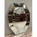 An octagonal bevelled wall mirror