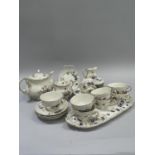 Zsolnay Hungary gilt and flower tea service comprising eight cups and saucers, eight tea plates,