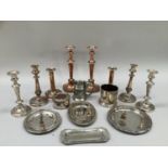 Quantity of silver plate on copper items including bottle coaster with foliate cast rim, another