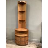 A Nathan corner cabinet with two shelves above another curved shelf above two door compartment,