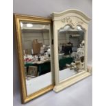 Cream moulded overmantel mirror with pediment 72cm x 59cm together with a gilt example, 49cm x 75cm
