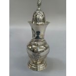 A late Victorian silver sugar caster, Birmingham 1900 for Walker and Hall, banded baluster form with