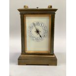 A late 19th century French repeating carriage clock in rectangular five light brass case with hinged