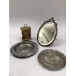 Norwegian pewter dish with moulded edge, oval mirror with strut back, Cyma gilt metal clock with