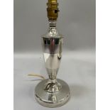 A George V silver table lamp, No.325841, patented Birmingham 1930, of circular outline with engine