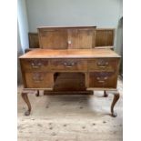 A 1930s mahogany part bedroom suite comprising dressing table with one long drawer beside four short