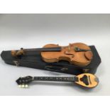 Violin 11", stamped Andrews Harrogate, in case together with a Greek Baglamas