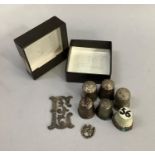 A collection of six late 19th Century and early 20th Century silver thimbles including one by