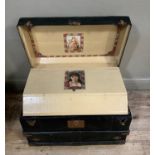 Tin and wooden banded dome topped travel trunk with gilt decoration