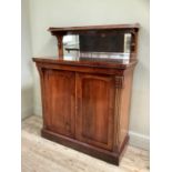 Victorian rosewood double door chiffonier with raised mirrored back and shelf, with scrolled angle