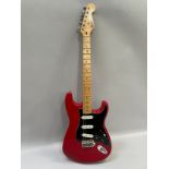 A Mexican Fender Stratocaster electric guitar serial no.MN8149744 c. 1994, red lacquer body with