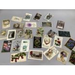 A collection of early 20th century greeting cards approx. 28