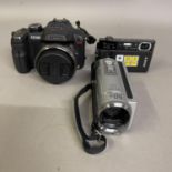 A Panasonic LUMIX FZ100 digital camera with carry case and two batteries, a Sony DSC-T500 digital