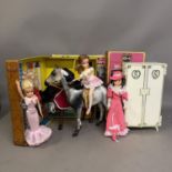 A Sindy Horse (boxed), three Sindy Dolls, a Sindy Wardrobe (boxed), a Sindy Apartment Carry Case and