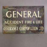 A brass General Accident Fire & Life Assurance Corporation Ltd building insurance sign.