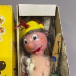 A pair of Pelham Puppets, comprising of Old Man and Cleaning Lady, both boxed