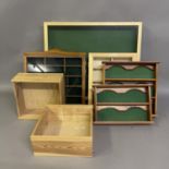 A collection of seven display boxes and shelves.